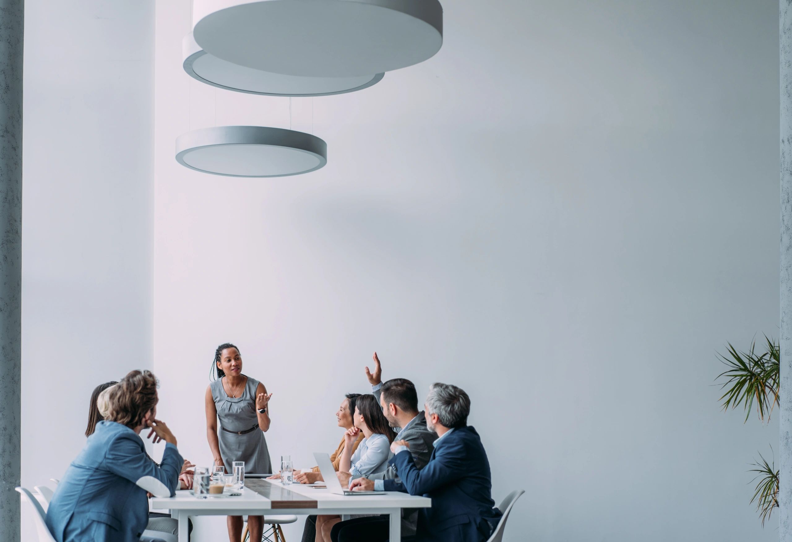Professional team meeting showing collaborative service